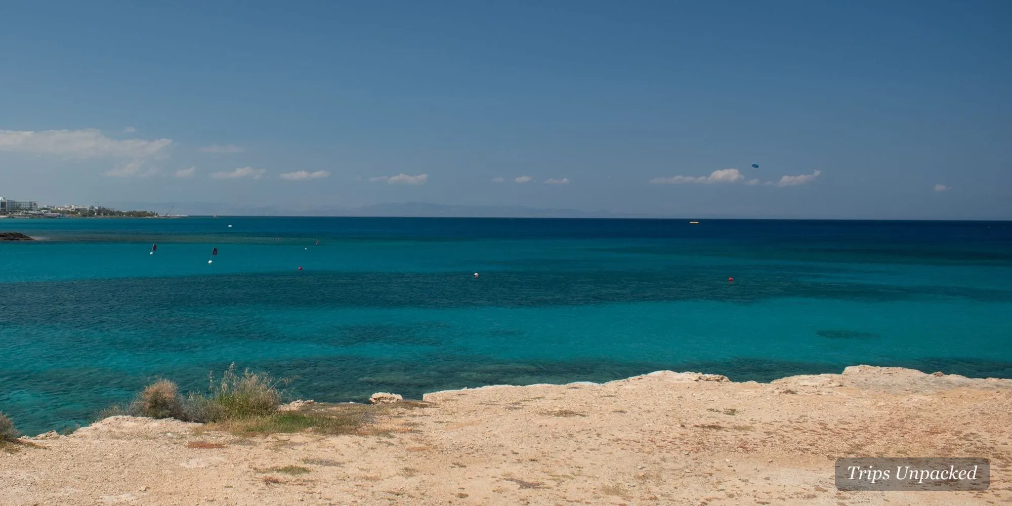 Turquoise Ayia Napa bay seen from a rocky shoreline point