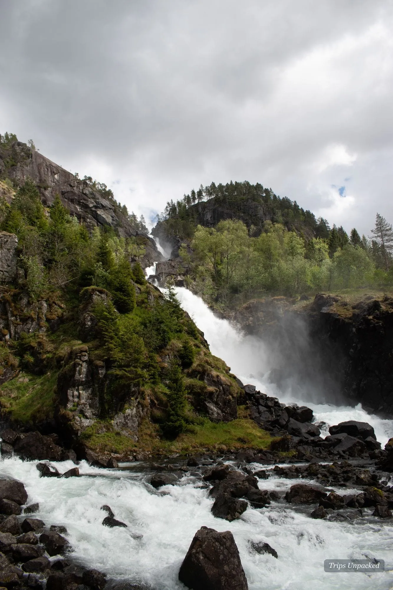 Låtefossen - two braided streams meeting above an old stone bridge near Odda.